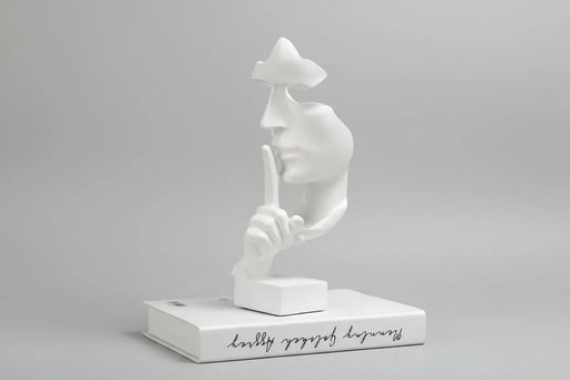 White abstract sculpture on a blue background